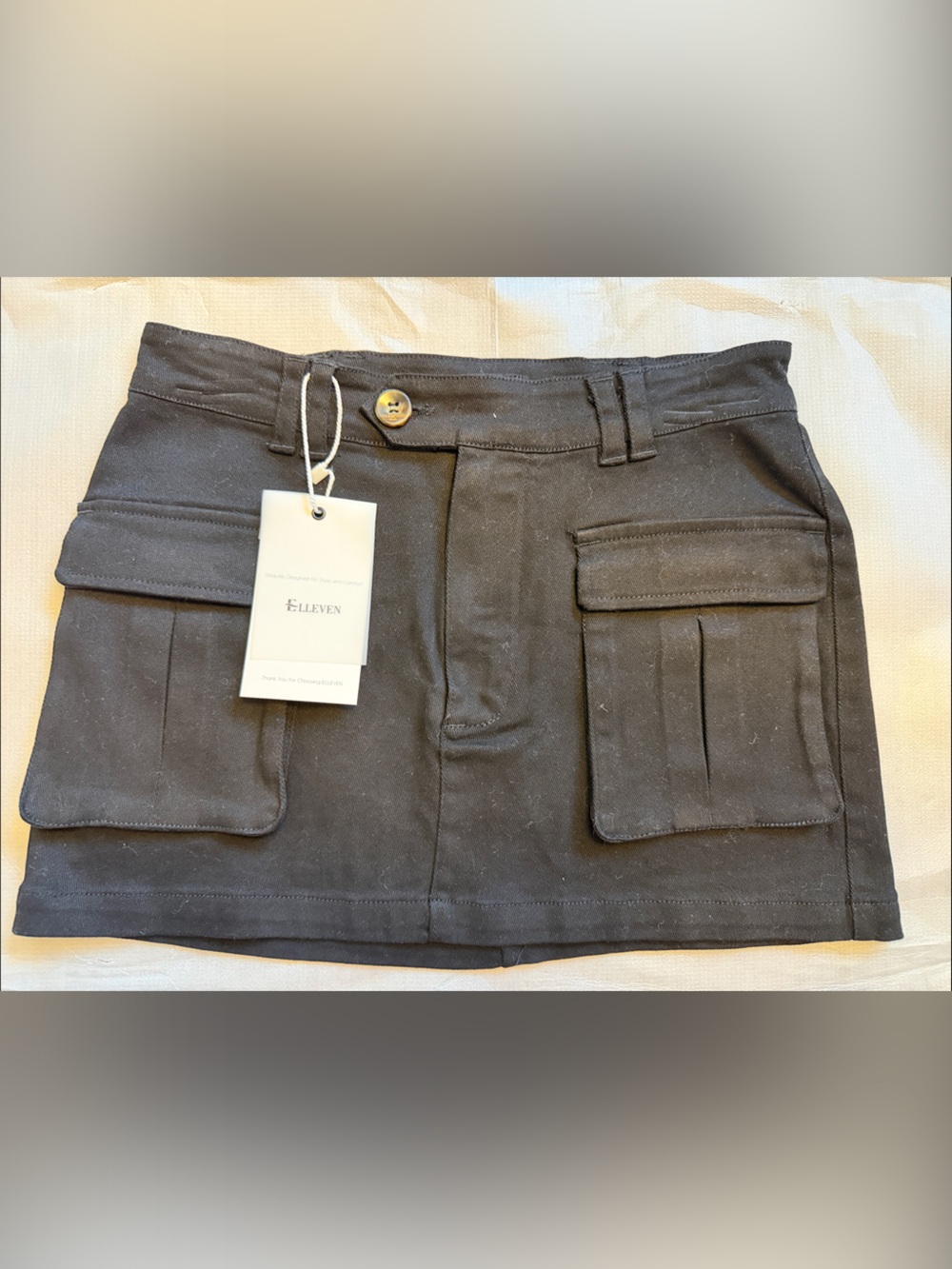 Black Mini Skirt with Front Patch Pockets